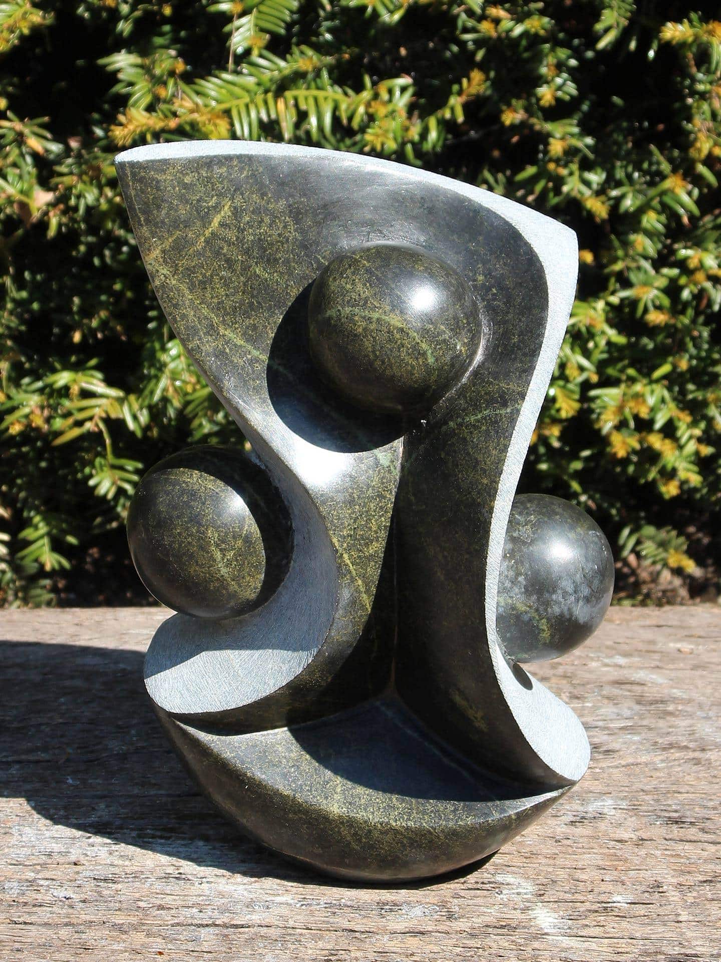 Three Afrikaans tuinbeeld serpentijn, 29 cm